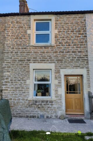 Raking out and repointing in of natural stonework